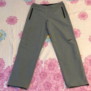 NIKE track pants grey colored.